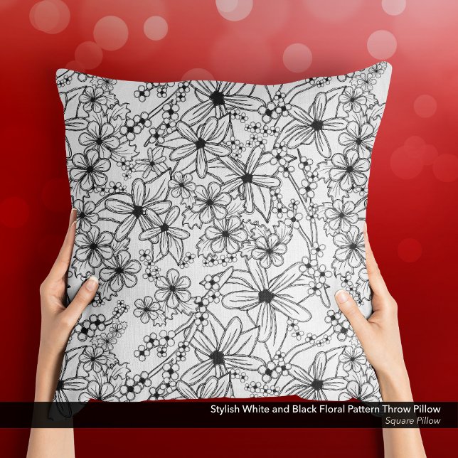 Stilvolles Weiß- und Schwarz-Blumen-Muster Kissen (Stylish White and Black Floral Pattern Throw Pillow with a Sketch-Like Hand-Drawn Feel.)