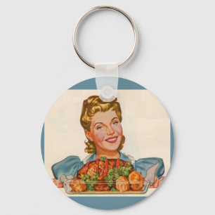 stolze Hausfrau mit ihrem Dinner-Schaffen Schlüsselanhänger