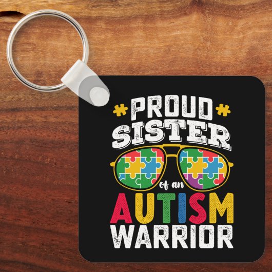 Stolze Schwester einer Familie des Autismus Kriege Schlüsselanhänger (Vorderseite)