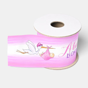 Storch-Baby ist auf seiner Weisenrosa-Babyparty Ripsband