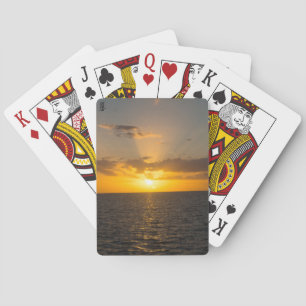Strahlender Sonnenuntergang über dem Ozean Spielkarten