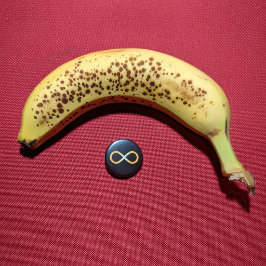 Strahlendes Gold Autism Awareness Unendlicher Knot Button