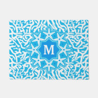 Strand-Korallenriffstarfish-Monogramm im Seeblau