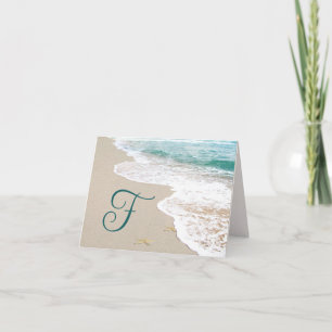 Strand mit Monogrammbuchstabe F