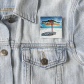 Strand-Stuhl und silberner Sand-Strand des Button (Beispiel)