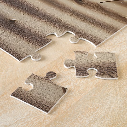 Strandfußabdrücke in Sand Puzzle (Seite)