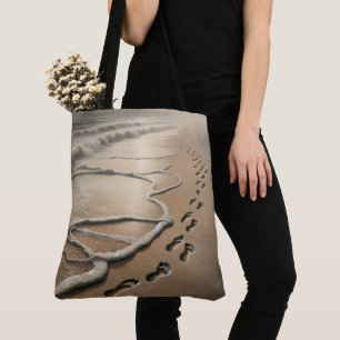 Strandfußabdrücke in Sand Tasche