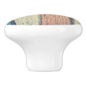 Strandhaus aus gestrichenem Holz am Ozean gestreif Keramikknauf (Seitenansicht)