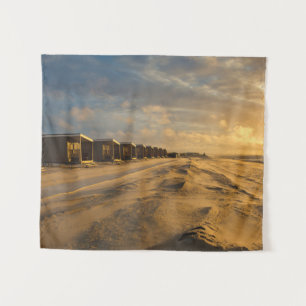 Strandhütten bei Sonnenuntergang an der niederländ Wandteppich