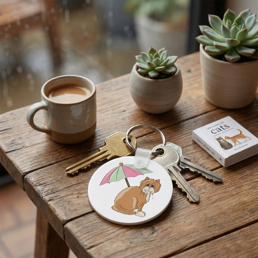 Strandkatze mit rosa und grünem Schirm Schlüsselanhänger