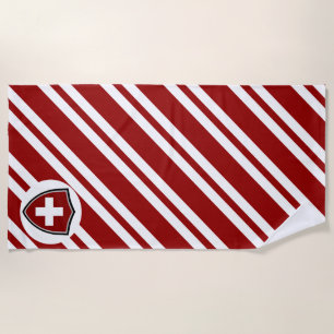 Strandtuch unter Schweizer Flagge