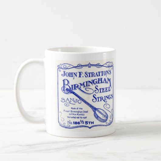 Strattons reiht Tasse auf (Links)