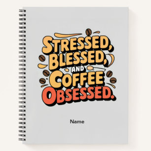 Stressgepresstes, gesegnetes und kaffeegetränktes notizblock