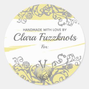 Strickende Nadeln des Garns handgemacht mit Runder Aufkleber