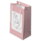 String Lights Geschenktasche (weich rosa) Kleine Geschenktüte (Rückseite Schrägansicht)