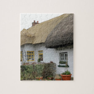 Strohdächer in Adare Irland Puzzle