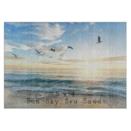 Sun. Sky. Meer. Sand. Strand Szene  Schneidebrett