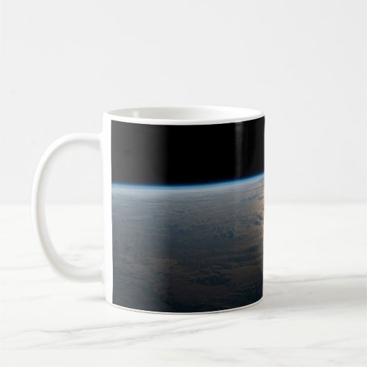 Sunglint strahlt aus einem teilweise bewölkten Süd Kaffeetasse (Links)