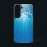 Sunlit Korallenriff Tough Phone Case Samsung Galaxy Hülle<br><div class="desc">Tauchen Sie jedes Mal in die atemberaubende Schönheit einer sonnenverwöhnten Unterwasserwelt ein, wenn Sie Ihr Telefon abholen. Dieses atemberaubende Handy-Gehäuse zeichnet sich durch ein lebendiges Bild brillanter Sonnenbänke aus, die durch klares blaues Wasser durchdringen und ein florierendes Korallenriff erhellen, das von farbenfrohen Fischen wimmelt. Die einzigartige Aussicht auf die Oberfläche...</div>