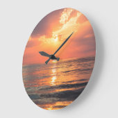sunset over water große wanduhr (Winkel)