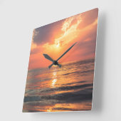 sunset over water quadratische wanduhr (Winkel)
