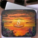 Sunset Plaza Marina 2584 Laptopschutzhülle<br><div class="desc">Malerei "Sunset Plaza Marina 2584" Sammlung Personalisieren Sie auf der Produktseite oder klicken Sie auf "Anpassen" Taste für weitere Designoptionen. Das Design, das aus meinem Gemälde "Sunset Plaza Marina 2584" entstand, vereint einen lebhaften Sonnenuntergang mit Streifen in Orange und Rot, die den Himmel füllen, gerahmt von der silhouetted Vegetation und...</div>