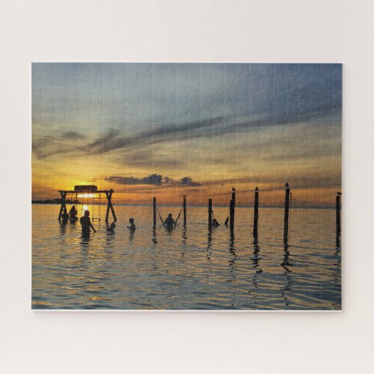 Sunset with Wooden Posts in Water Puzzle (Horizontal)