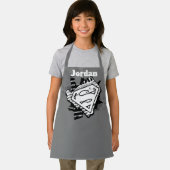 Supergirl Newsprint S-Shield Schürze (Insitu)