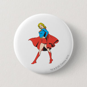 Supergirl schlägt eine Pose Button