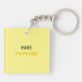 Superhero Yellow Acrylic Schlüsselanhänger von Adi (Rückseite)