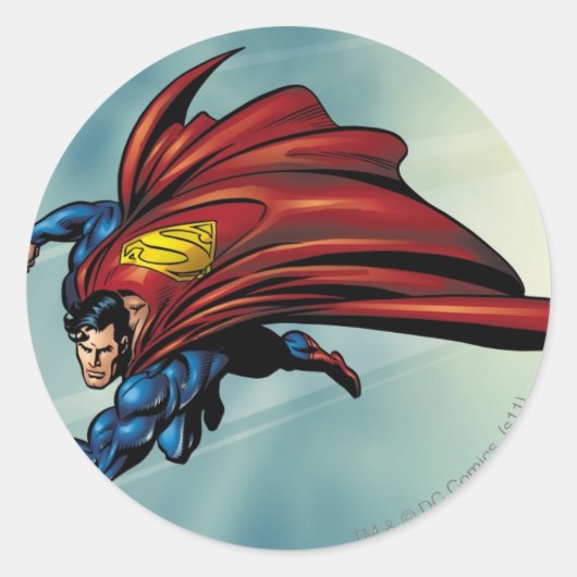 Superman fliegt mit Kap Runder Aufkleber (Vorderseite)