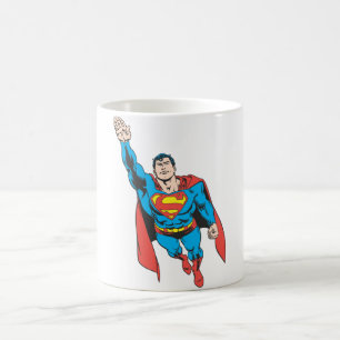 Superman-Rechtsarm erhöht Kaffeetasse