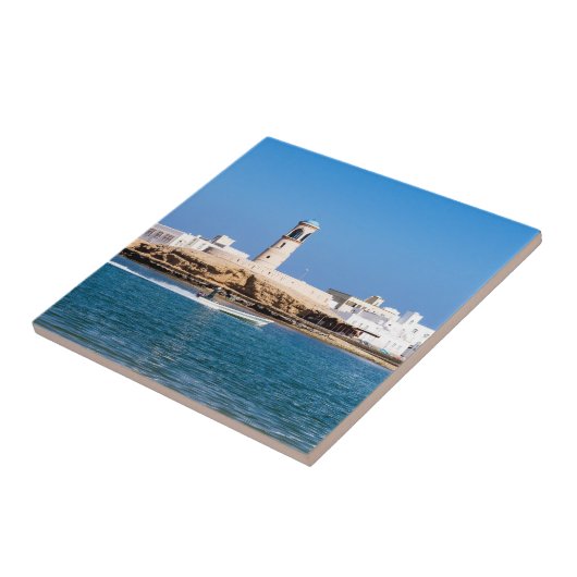 Sur Lighthouse mit Fischerboot - Sur, Oman Fliese (Seite)