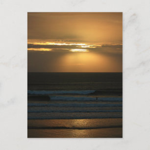 Surfen bei Sonnenuntergang in Polzeath Postkarte