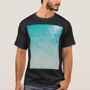 Surfer aus der Luft, klare Ozeane. T-Shirt