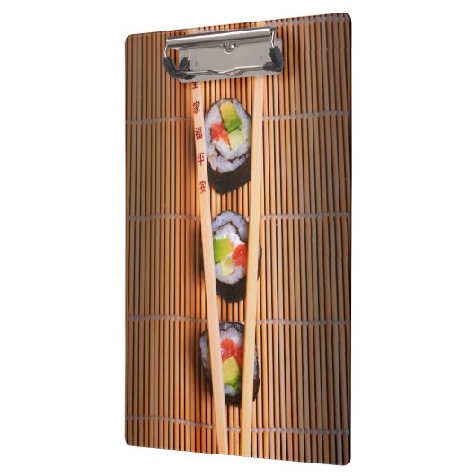 Sushi und hölzerne Essstäbchen Klemmbrett (Links)