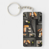 Sushisammlung auf schwarzem Hintergrund Schlüsselanhänger (Vorderseite)