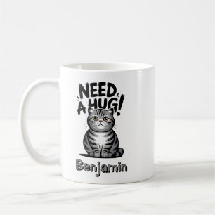 Süße getigerte Katze braucht eine Umarmung lustige Kaffeetasse