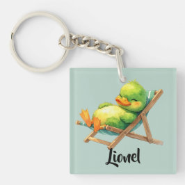 Süße grüne Ente liegt entspannt im Liegestuhl Schlüsselanhänger