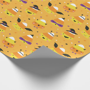 Süße Halloween Candy Corns in orangefarbenem Kostü Geschenkpapier