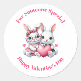 Süße Kaninchen teilen ein Herz zum Valentinstag Runder Aufkleber