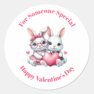 Süße Kaninchen teilen ein Herz zum Valentinstag Runder Aufkleber