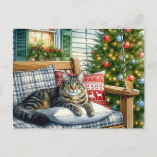 Süße Katze liegt neben Weihnachtsbaum Feiertags-Po Postkarte