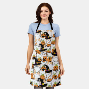 Süße Katzenhexe hält Bumkin Halloween Schürze
