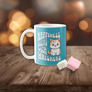 Süße leuchtend blaue lustige Katze sagt Kaffeetasse