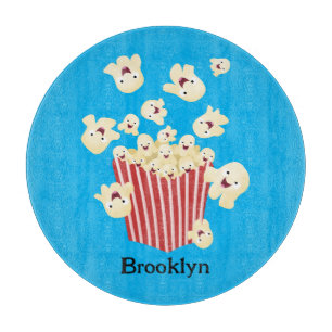 Süße lustige springende Popcorn-Cartoonfiguren Schneidebrett