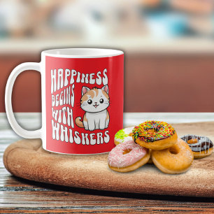 Süße rote lustige Katze sagt Kaffeetasse