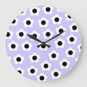 Süße Schwarz-Weiß-Blume mit blauem Hintergrund Große Wanduhr