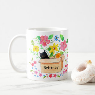 Süße schwarze Katze in einer Box Blumen mit indivi Kaffeetasse