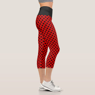 Süße schwarze Tupfen auf Rot Capri Leggings